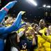 Michigan freshman Glenn Robinson III celebrates with students after defeating Ohio State 76-74 on Tuesday, Feb. 5. Daniel Brenner I AnnArbor.com